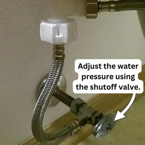 Adjust the water pressure using the shutoff valve