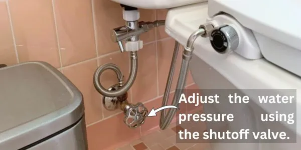 Adjust the water pressure using the shutoff valve